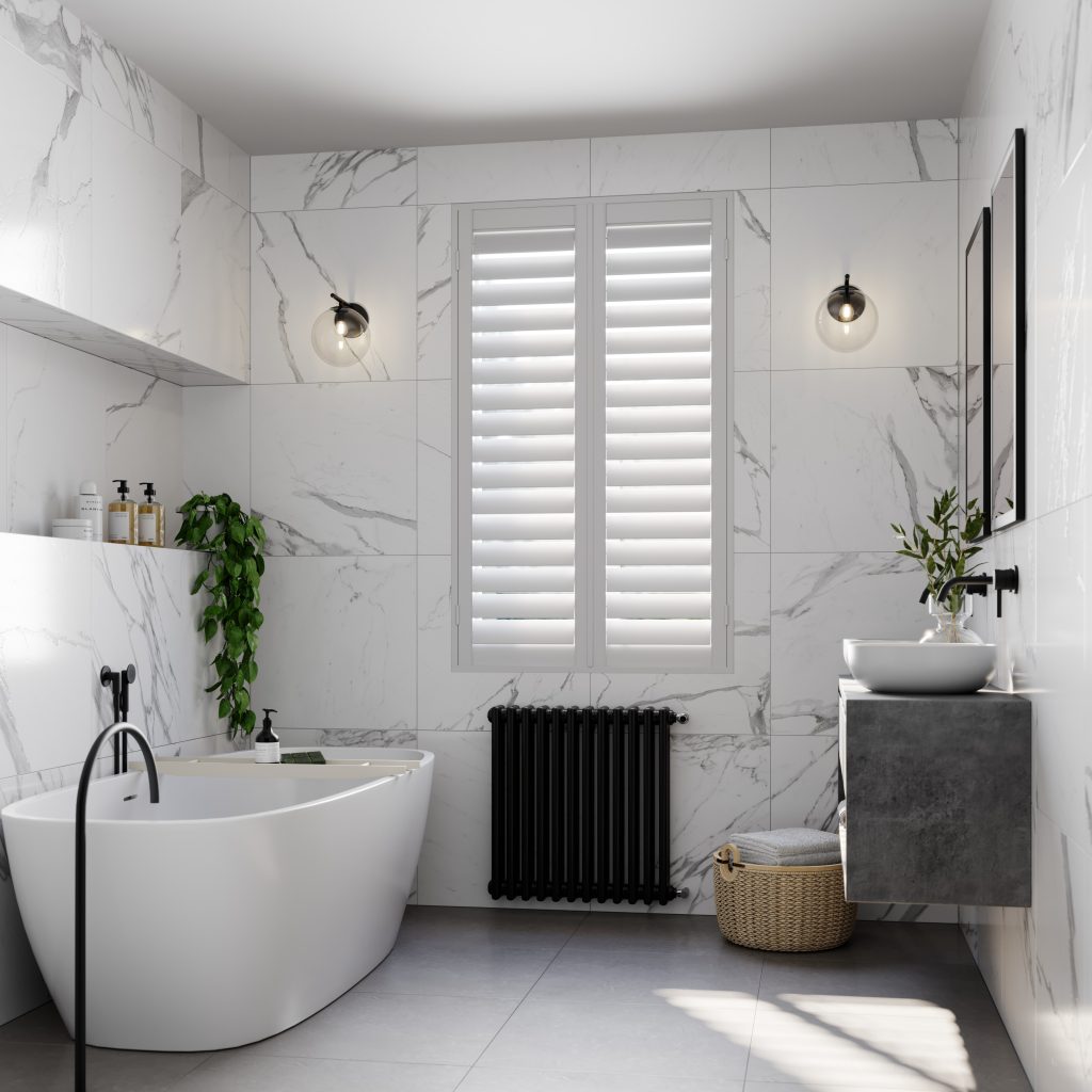 Modern marble bathroom with freestanding tub, black column radiator, plantation shutters, and floating vanity with vessel sink.